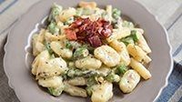 Gnocchi di miglio con asparagi e pancetta-1